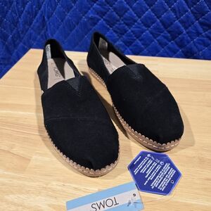TOMS Classic Black Canvas Slip-Ons